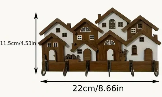 Nástěnný držák na klíče v podobě domu 